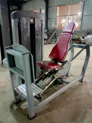 Máquina de pressão de pernas sentada com pesos de seleção de carga de alfinete